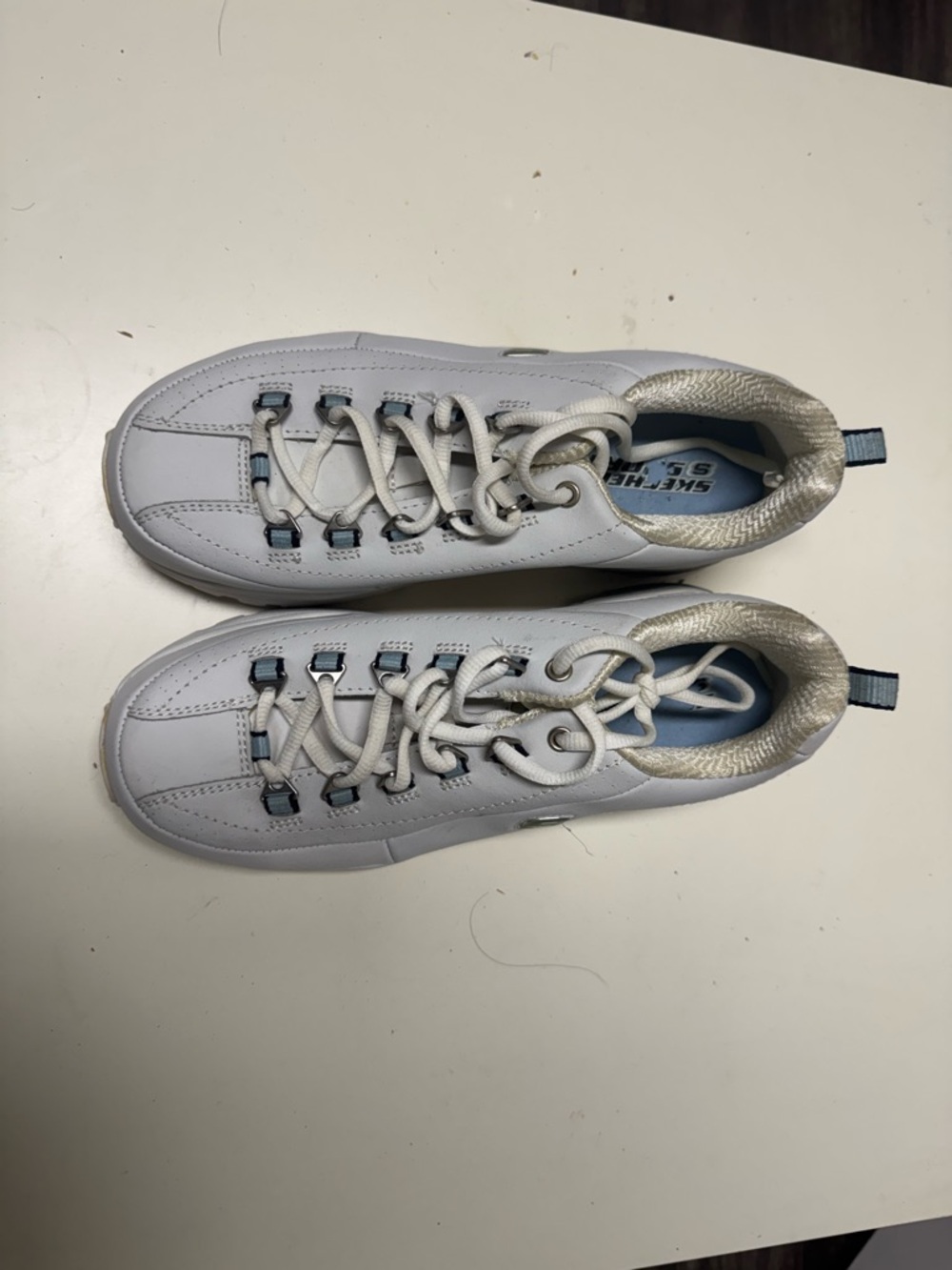Skechers White Sneakers with Light Blue Accents